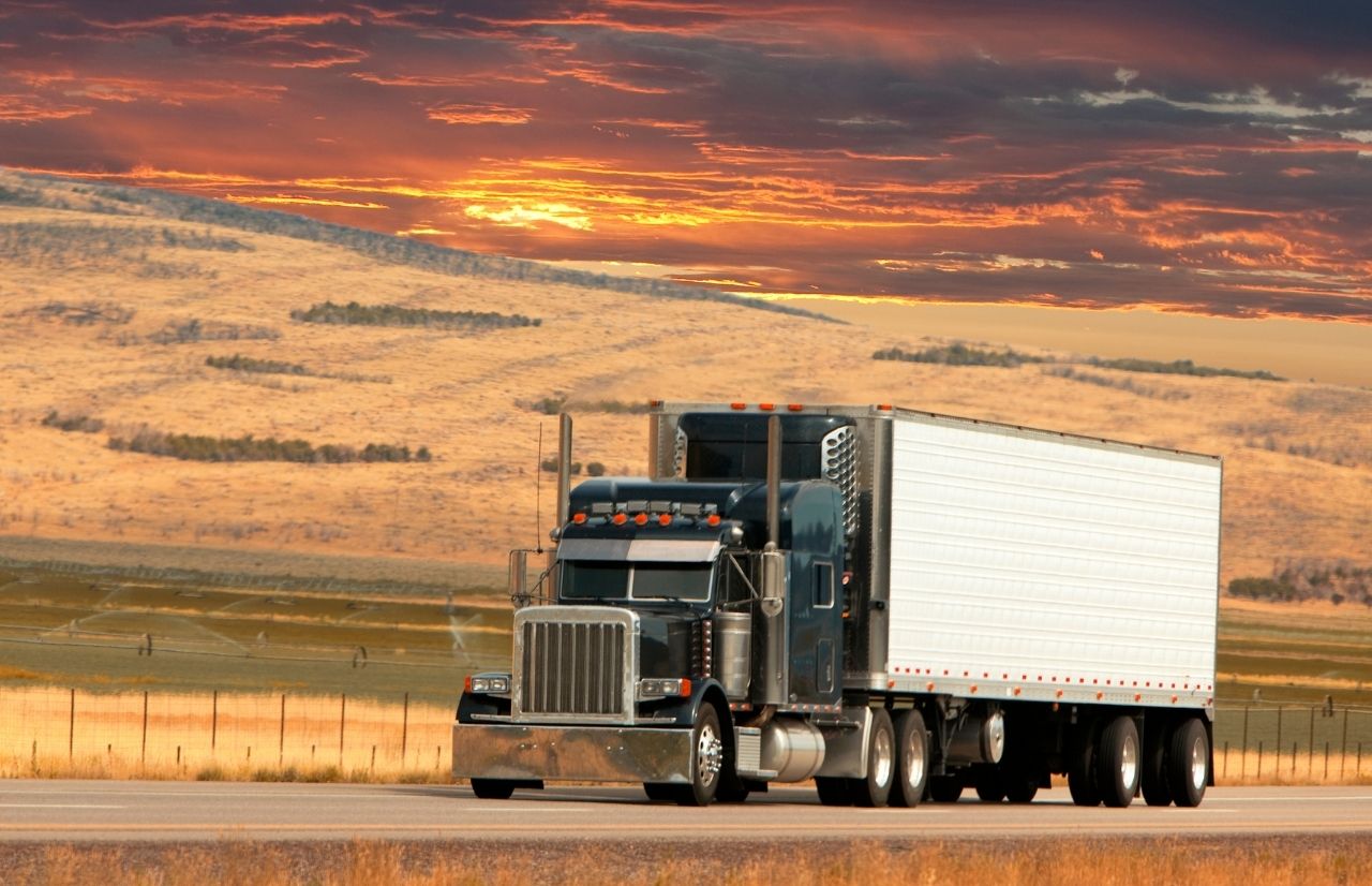 IRS Form 2290 trucker on scenic farmland
